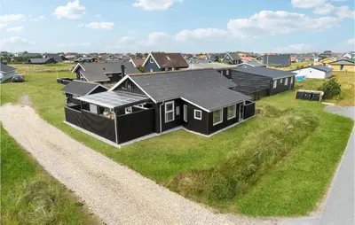 an overhead view of a house with black roofs at Nice Home In Thisted With Kitchen in Thisted