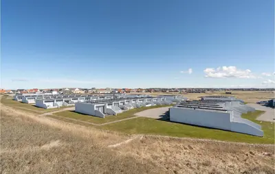 an aerial view of a building in a field at Amazing Home In Vestervig With Sauna in Vestervig