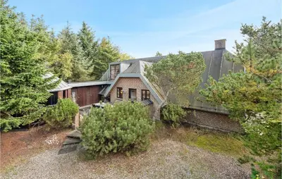 an aerial view of a house with trees at Cozy Home In Vestervig With Sauna in Vestervig