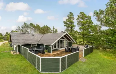 a modular home with a deck and a house at Beautiful Home In Thisted With Kitchen in Thisted