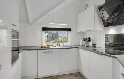 a white kitchen with white cabinets and a window at Beautiful Home In Thisted With Kitchen in Thisted