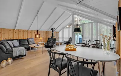 a living room with a couch and a table at Beautiful Home In Thisted With Kitchen in Thisted