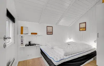 a white bedroom with a large bed in a room at Beautiful Home In Thisted With Kitchen in Thisted