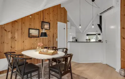 a kitchen and dining room with a table and chairs at Beautiful Home In Thisted With Kitchen in Thisted