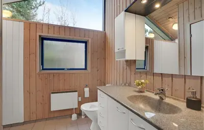 a bathroom with a sink and a toilet at Beautiful Home In Thyholm With Wifi in Thyholm