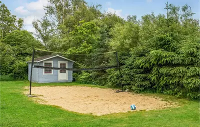a volley ball hoop in front of a house at 7 Bedroom Gorgeous Home In Vinderup in Vinderup