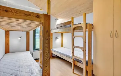 a couple of bunk beds in a small room at Lovely Home In Hanstholm With Wifi in Hanstholm
