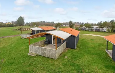 an overhead view of a row of houses in a field at Stunning Home In Hanstholm With Kitchen in Hanstholm