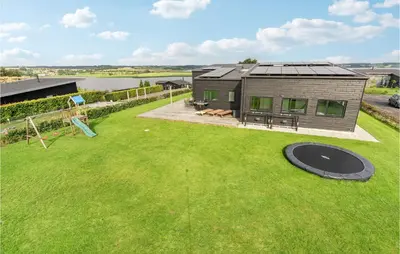 an overhead view of a house with a large yard at Lovely Home In Løgstrup With Wifi in Løgstrup