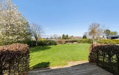 a view of a yard with trees and grass at Gorgeous Home In Farsø With Kitchen in Farsø