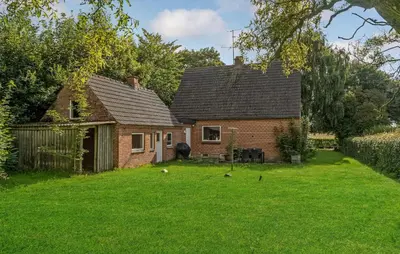a house with a yard in front of it at 3 Bedroom Nice Home In Fur in Fur