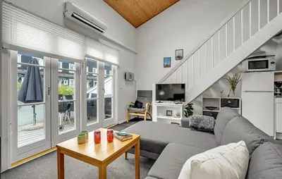 a living room with a couch and a table at Awesome Apartment In Vestervig in Vestervig