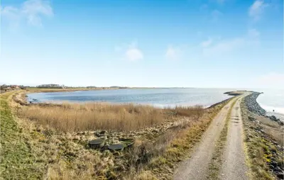 a dirt road next to a body of water at Beautiful Home In Nykøbing M With Wifi in Sønder Dråby