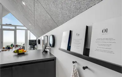 a kitchen with a counter with a bowl of fruit on it at Stunning Apartment In Thisted With Wifi in Thisted