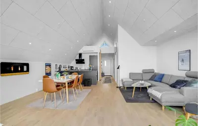 a living room with a couch and a table at Stunning Apartment In Thisted With Wifi in Thisted