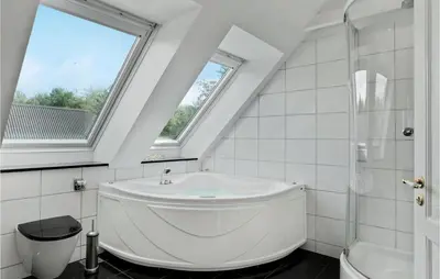 a white bathroom with a sink and a shower at Lovely Home In Aabybro With Kitchen in Åbybro