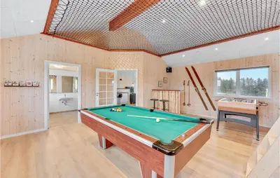 a room with a pool table in it at Stunning Home In Spøttrup With Sauna in Spottrup