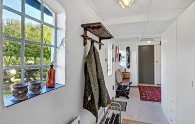 a hallway with a window in a house at Amazing Home In Nykøbing M With Wifi in Tæbring