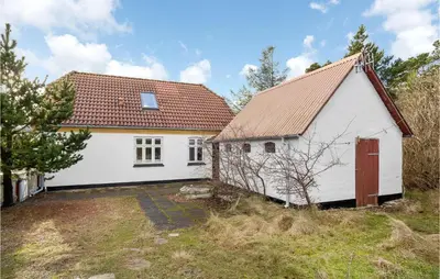 a white house with a red roof at Nice Home In Bedsted Thy in Bedsted Thy
