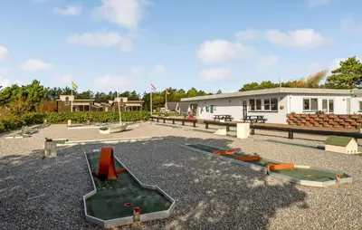 a group of playground equipment in front of a building at 1 Bedroom Gorgeous Home In Vestervig in Vestervig