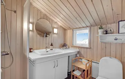 a bathroom with a sink and a toilet at Stunning Home In Lemvig With Wifi in Lemvig