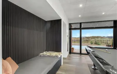 a room with a bench and a large window at Gorgeous Home In Thisted With Wifi in Thisted