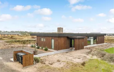 a house in the middle of a field at Gorgeous Home In Thisted With Wifi in Thisted