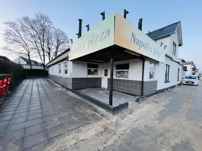 a building with a sign that reads kapoptosis hop at aday - 3 bedrooms luxurious apartment in Svenstrup in Svenstrup