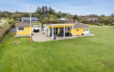 an aerial view of a house with a yard at 3 Bedroom Amazing Home In Spøttrup in Spottrup