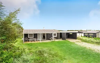 a house with a large yard in front of it at Cozy Home In Thisted With Wifi in Thisted