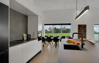 a kitchen with a table with fruits and vegetables on it at Nice Home In Spøttrup With Sauna in Spottrup