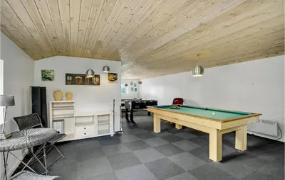 a pool table in a room with a ceiling at Amazing Home In Vestervig With Sauna in Vestervig