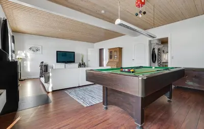a living room with a pool table in it at Awesome Home In Bedsted Thy With Wifi in Bedsted Thy