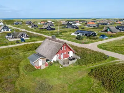 an overhead view of a village with a red house at Holiday Home Iines - 200m from the sea by Interhome in Harboør