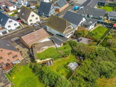 an aerial view of a house in a residential neighborhood at Holiday Home Eluisa - 300m from the sea by Interhome in Thyborøn