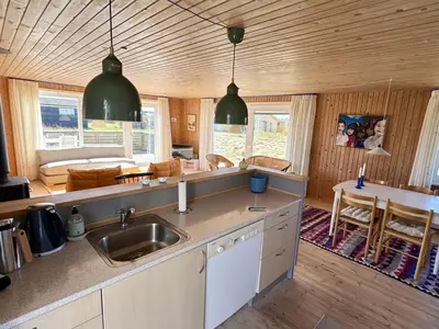 a kitchen with a sink and a counter top at Holiday Home Bera - 250m from the sea by Interhome in Torsted