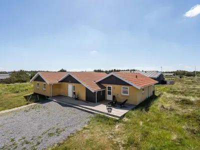 an aerial view of a house in a field at Holiday Home Milena - 600m from the sea by Interhome in Torsted
