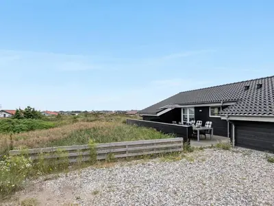 a house on the beach with a fence at Holiday Home Mavis - 800m from the sea by Interhome in Torsted