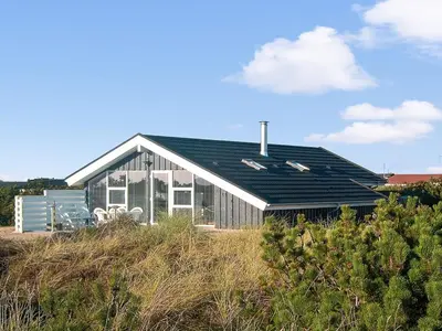 a house with solar panels on the side of it at Holiday Home Laurentia - 800m from the sea by Interhome in Torsted