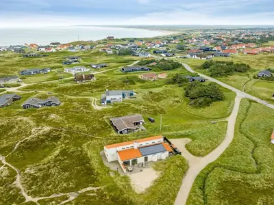 an aerial view of a home with a road leading to it at Holiday Home Teijo - 400m from the sea by Interhome in Torsted