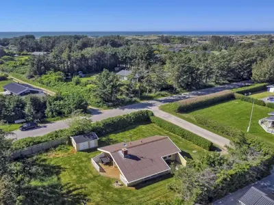 an overhead view of a house with a roof at Holiday Home Eden - 800m from the sea by Interhome in Løkken