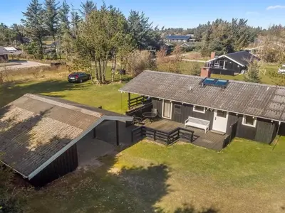 an overhead view of a house with a roof at Holiday Home Conradine - 500m from the sea by Interhome in Løkken