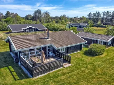 an overhead view of a house with a roof at Holiday Home Awarth - 500m from the sea by Interhome in Løkken