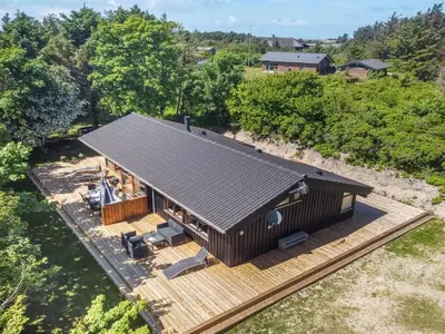 an overhead view of a house with a deck at Holiday Home Paulette - 450m from the sea by Interhome in Løkken