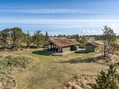 a house in the middle of a field at Holiday Home Alfrik - 900m from the sea by Interhome in Blokhus