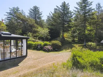 a view of the garden from the back of the house at Holiday Home Lykka - 950m from the sea by Interhome in Blokhus