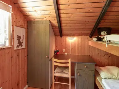 a small room with a desk in a cabin at Holiday Home Maritha - 950m from the sea by Interhome in Saltum