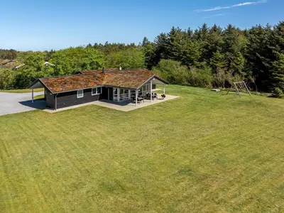 an overhead view of a small house in a field at Holiday Home Ricus - 1-8km from the sea by Interhome in Saltum