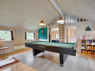 a large room with a pool table in it at Holiday Home Alhed - 650m from the sea by Interhome in Saltum