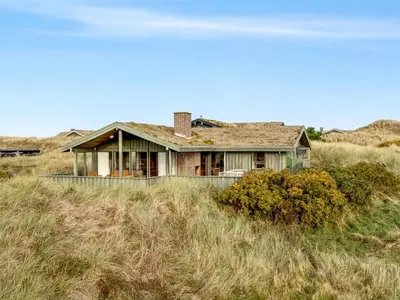 an old house in the middle of a field at Holiday Home Fransine - 480m from the sea by Interhome in Saltum